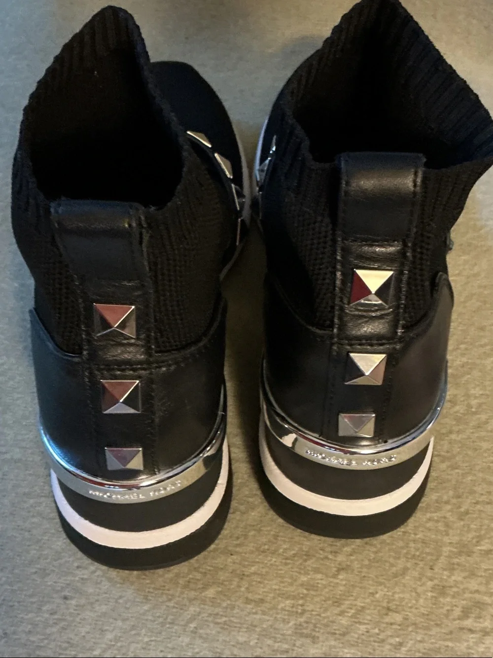 Michael Kors Black Knit Slip-On Sneakers with Silver Pyramid Stud Strap